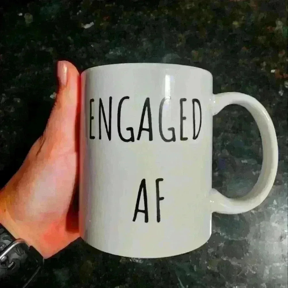 Engaged af coffee cup